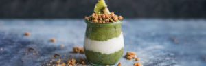 Matcha Chia Pudding Parfait topped with Kiwi and Granola