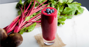 Marathon Recovery Smoothie made with Blueberry Oat, cherry juice, frozen berries, and beets.