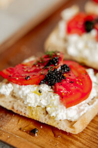 Farmer Cheese Caviar Toast made with Organic Lifeway Farmer Cheese, tomatoes, and caviar on ciabatta bread