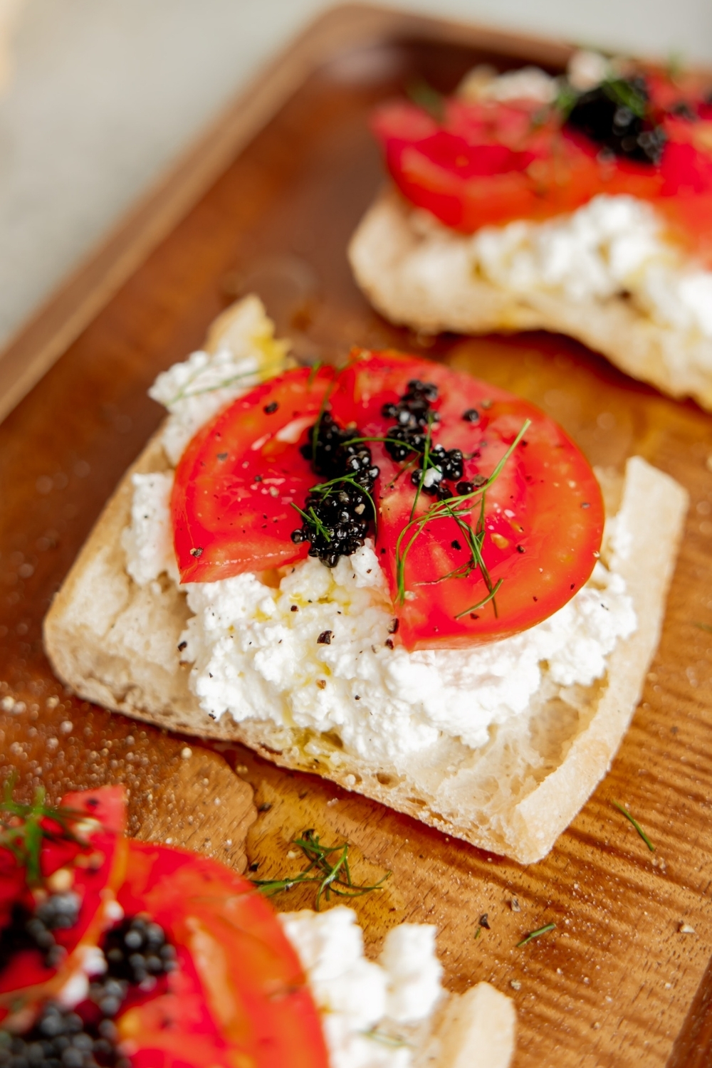 Farmer Cheese Caviar Toast made with Organic Lifeway Farmer Cheese, tomatoes, and caviar on ciabatta bread