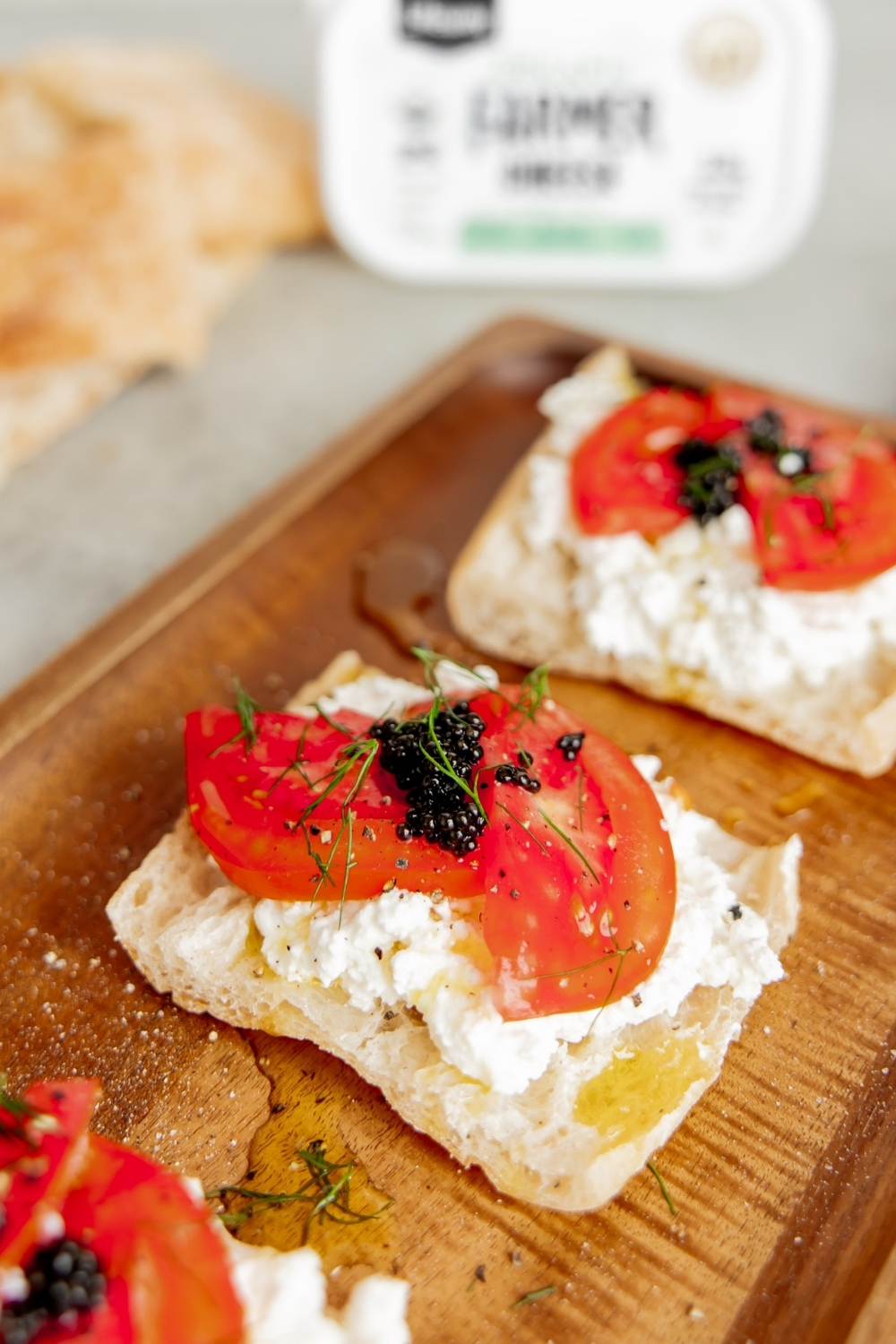 Farmer Cheese Caviar Toast made with Organic Lifeway Farmer Cheese, tomatoes, and caviar on ciabatta bread