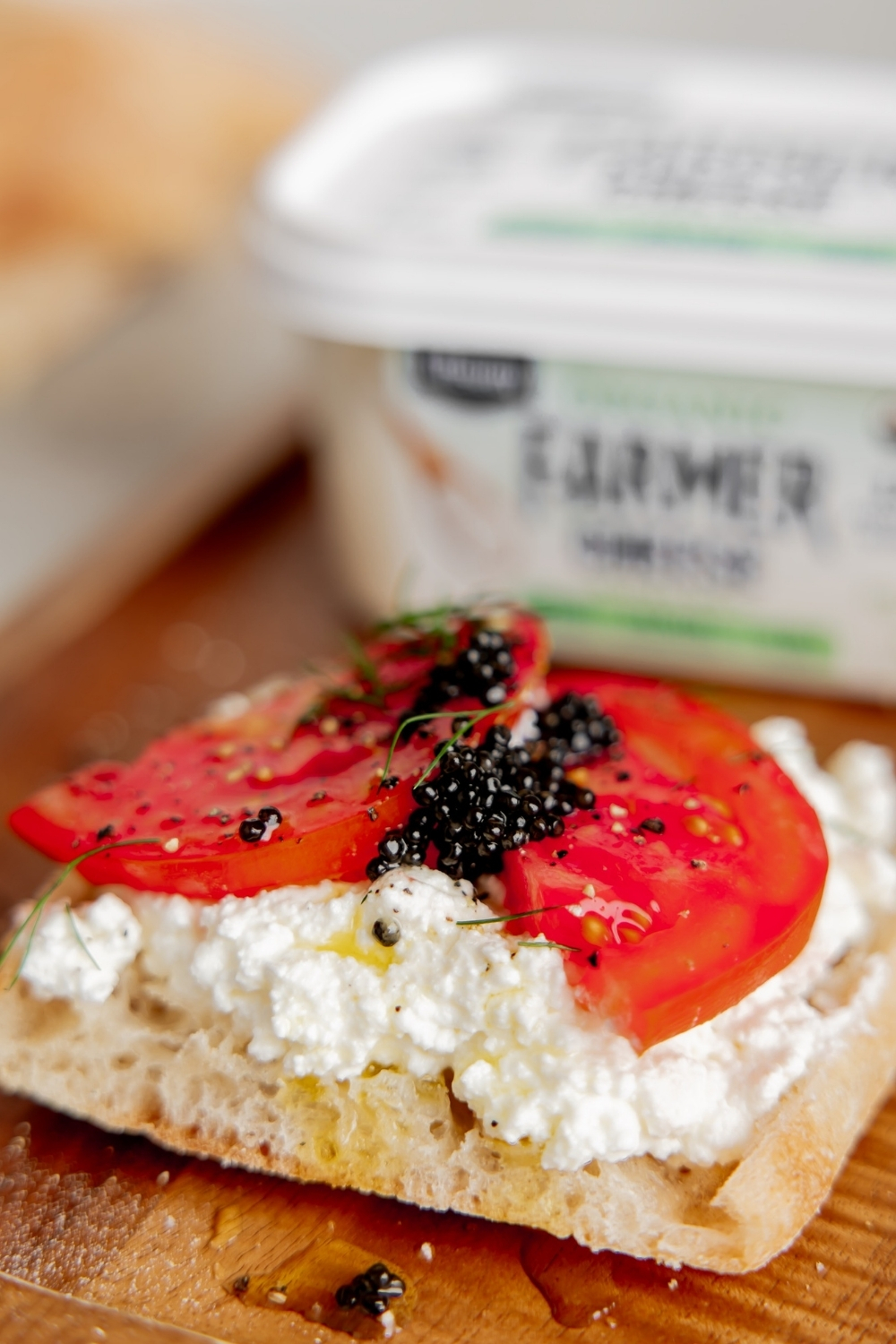 Farmer Cheese Caviar Toast made with Organic Lifeway Farmer Cheese, tomatoes, and caviar on ciabatta bread
