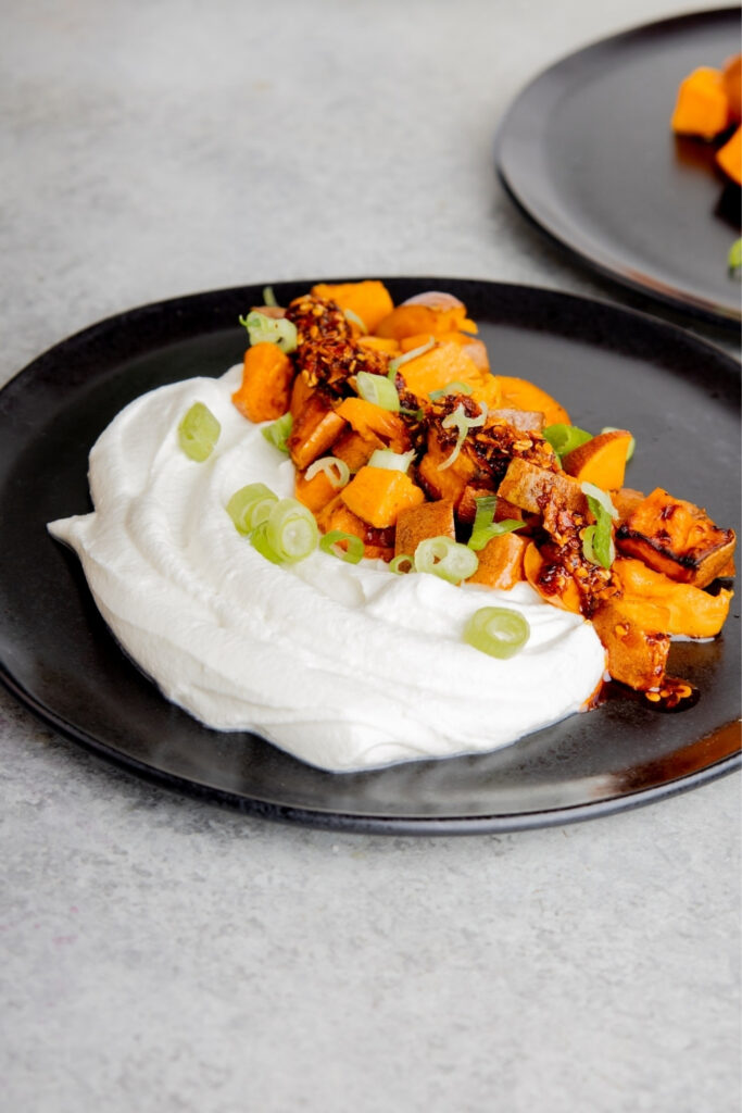 Roasted Sweet Potatoes with Whipped Farmer Cheese and Chili Crisp made with Lifeway Farmer Cheese