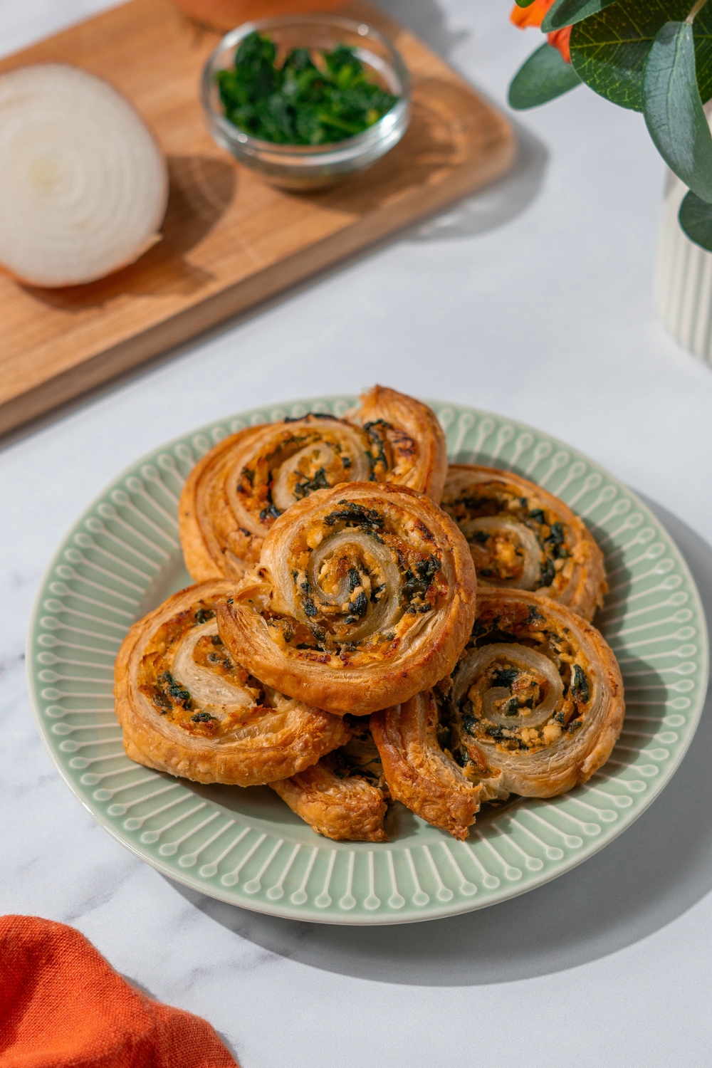 Spinach and Caramelized Onion Farmer Cheese Pinwheels made with Lifeway Farmer Cheese and Lifeway Kefir Butter